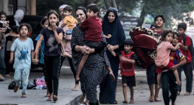 Thousands flee north Gaza after Israel evacuation warning